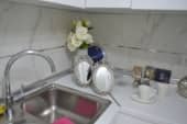 sudopera sa cesmom u kuhinji